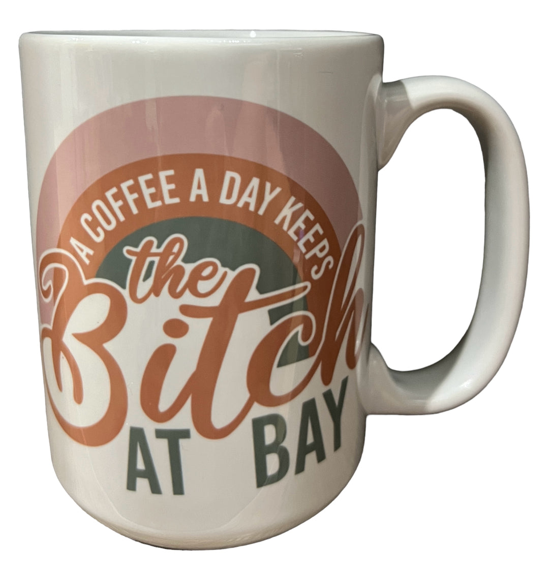 A coffee a day keeps the B*tch at bay - funny - ceramic mug